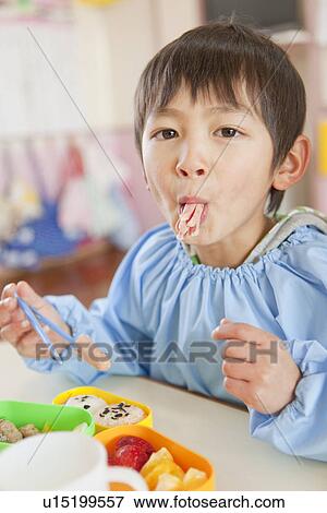 Kindergarten Boy Having Lunch View Large Photo Image Stock Photo - Kindergarten Boy Having Lunch. Fotosearch