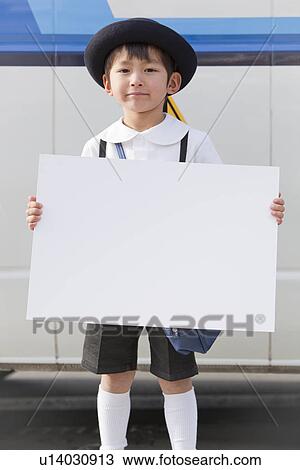 Stock Image - Kindergarten Boy Holding Message Board. Fotosearch