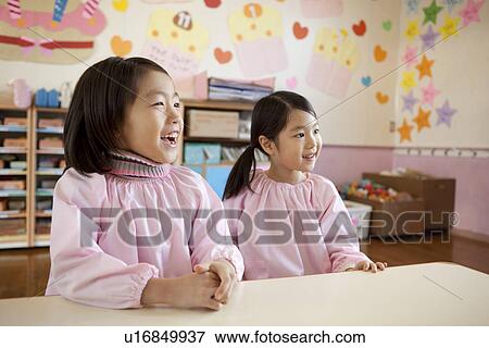 Stock Photo - Kindergarten Children Sitting. Fotosearch