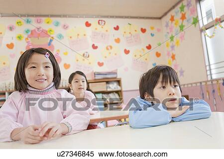 Stock Photography - Kindergarten Children Sitting. Fotosearch