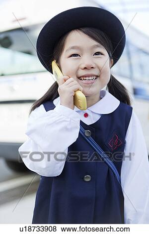 Kindergarten Girl Holding Cellular Phone View Large Photo Image Stock Photo - Kindergarten Girl Holding Cellular Phone. Fotosearch