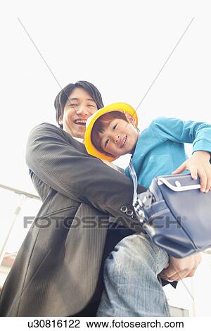 Businessman Holding Son View Large Photo Image Stock Image - Businessman Holding Son. Fotosearch