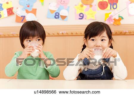 Stock Photograph - Children Drinking Milk. Fotosearch