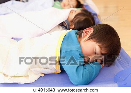 Children Sleeping at Day-care Center View Large Photo Image Stock Image - Children Sleeping at Day-care Center. Fotosearch