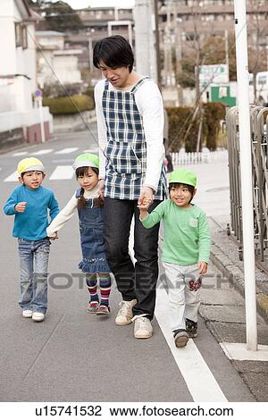 Nursery Teacher and Children Walking View Large Photo Image Stock Image - Nursery Teacher and Children Walking. Fotosearch