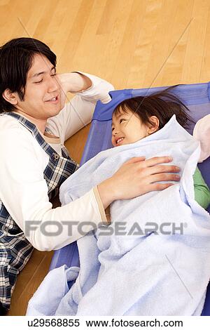 Nursery Teacher Lying Down Boy View Large Photo Image Stock Photography - Nursery Teacher Lying Down Boy. Fotosearch