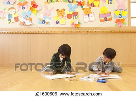Stock Photograph - Two Boys Painting. Fotosearch