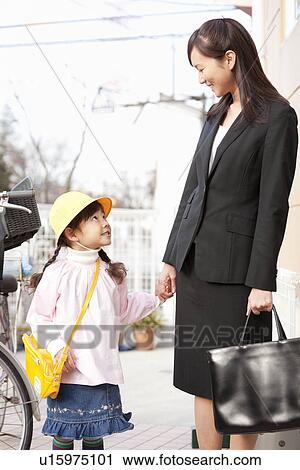 Working Woman Taking Daughter to Day-care Center View Large Photo Image Stock Image - Working Woman Taking Daughter to Day-care Center. Fotosearch