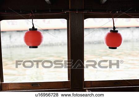 Chinese lanterns hanging on a tourboat View Large Photo Image Stock Photo - Chinese lanterns hanging on a tourboat. Fotosearch