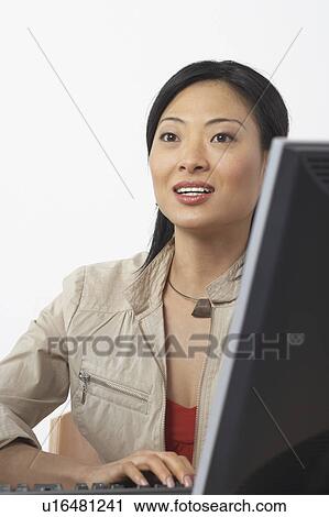 Close-up of a businesswoman using a computer View Large Photo Image Stock Image - Close-up of a businesswoman using a computer. Fotosearch