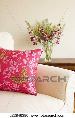 Stock Image - Close-up of a cushion on an armchair. Fotosearch