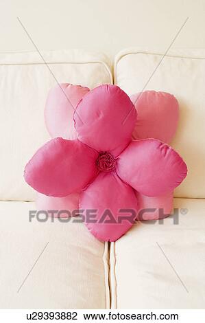 Close-up of a flower shaped cushion on a couch View Large Photo Image Stock Image - Close-up of a flower shaped cushion on a couch. Fotosearch