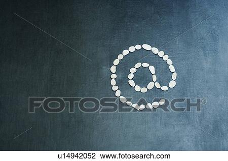 Stock Image - Close-up of an 'at' symbol. Fotosearch