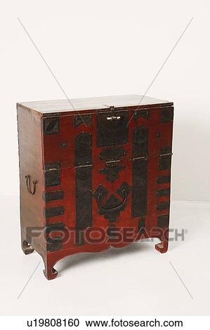 Stock Image - Close-up of an ornate wooden box. Fotosearch