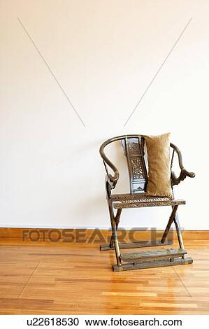 Stock Image - Cushion on a folding chair. Fotosearch