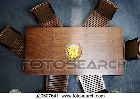 Stock Image - High angle view of a plate of flowers on the table. Fotosearch