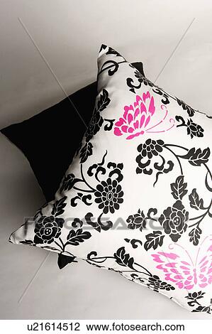 Stock Image - High angle view of two cushions. Fotosearch