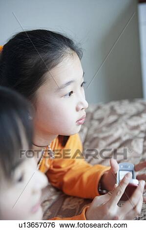 High angle view of two girls View Large Photo Image Stock Photograph - High angle view of two girls. Fotosearch