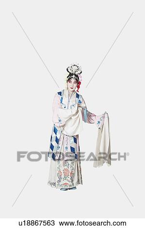 Stock Image - Mature woman wearing traditional clothing. Fotosearch