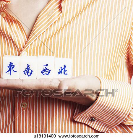 Mid section view of a man with blocks on his hand View Large Photo Image Stock Image - Mid section view of a man with blocks on his hand. Fotosearch
