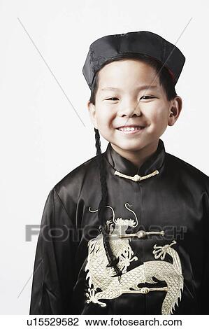 Stock Image - Portrait of a boy smiling. Fotosearch