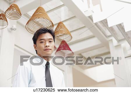 Portrait of a businessman View Large Photo Image Stock Photography - Portrait of a businessman. Fotosearch
