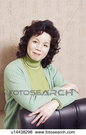 Stock Photo - Portrait of a businesswoman smiling. Fotosearch