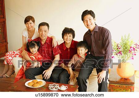 Portrait of a family smiling View Large Photo Image Stock Image - Portrait of a family smiling. Fotosearch