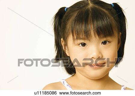 Stock Photograph - Portrait of a girl. Fotosearch