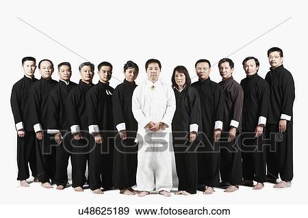 Stock Photo - Portrait of a group of people standing in a row. Fotosearch