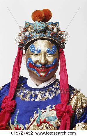 Stock Image - Portrait of a male Chinese opera performer smiling. Fotosearch