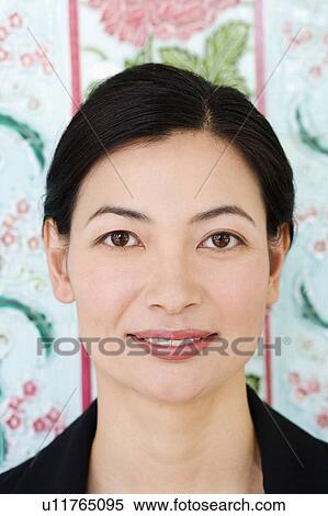 Portrait of a mid adult woman smiling View Large Photo Image Stock Photography - Portrait of a mid adult woman smiling. Fotosearch