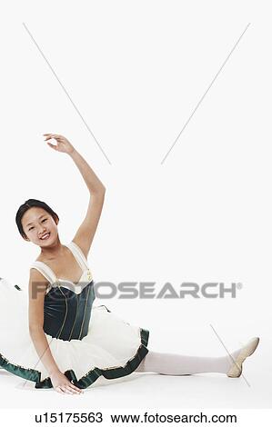 Portrait of a teenage girl performing ballet View Large Photo Image Stock Image - Portrait of a teenage girl performing ballet. Fotosearch
