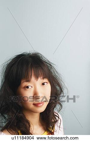 Portrait of a young woman View Large Photo Image Picture - Portrait of a young woman. Fotosearch