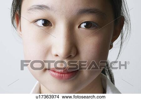 Portrait of a young woman View Large Photo Image Picture - Portrait of a young woman. Fotosearch