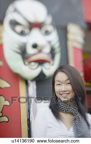 Portrait of a young woman smiling View Large Photo Image Stock Image - Portrait of a young woman smiling. Fotosearch