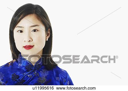 Stock Photograph - Portrait of a young woman smiling. Fotosearch