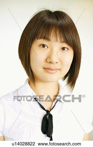 Stock Image - Portrait of a young woman. Fotosearch