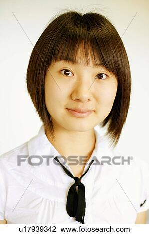 Stock Image - Portrait of a young woman. Fotosearch