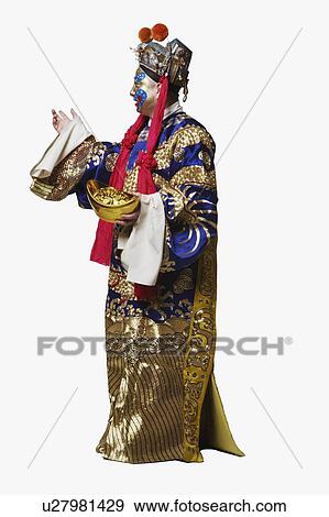 Side profile of a male Chinese opera performer holding a bowl full of gold coins View Large Photo Image Stock Photo - Side profile of a male Chinese opera performer holding a bowl full of gold coins. Fotosearch
