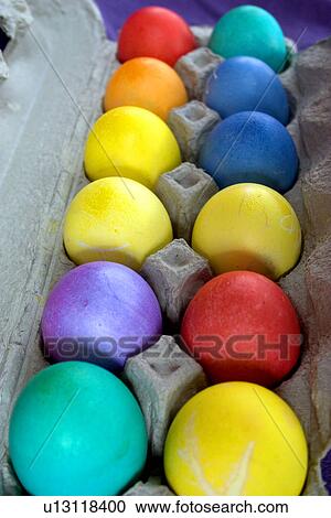 A dozen dyed Easter eggs in a carton View Large Photo Image Stock Image - A dozen dyed Easter eggs in a carton. Fotosearch