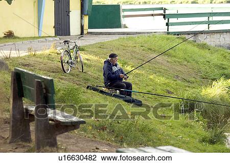 Man fishing View Large Photo Image Stock Image - Man fishing. Fotosearch