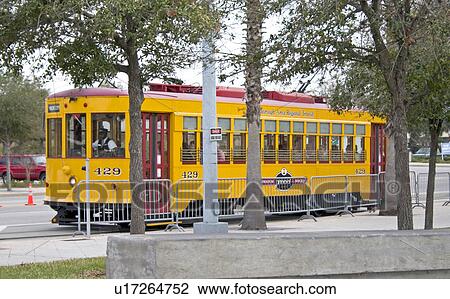 Stock Image - Yellow trolley. Tampa Florida USA. Fotosearch