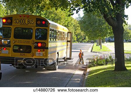 Young boy leaving school bus View Large Photo Image Stock Photograph - Young boy leaving school bus. Fotosearch