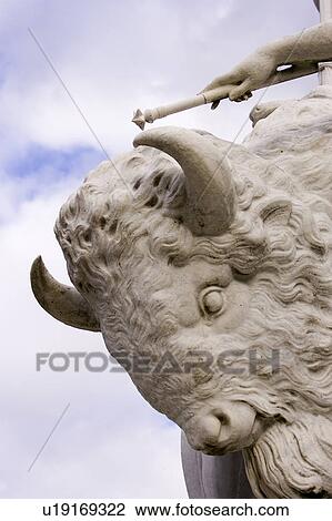 Stock Image - Animal Themes, Cloud, Close-Up, Carving, Animal Head. Fotosearch