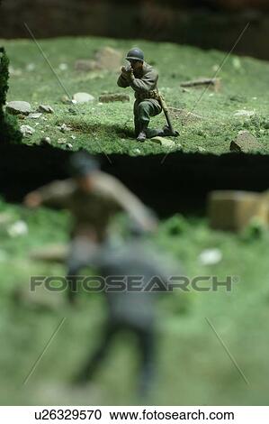 Stock Image - Army, Green, Firing, Figurine, Aim. Fotosearch