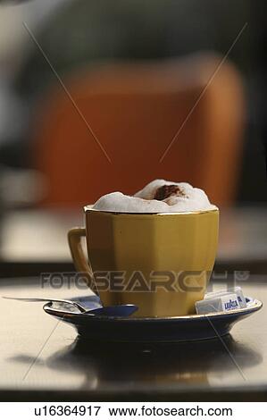 Stock Photo - beverage, saucer, spoon, outdoor, cafe, detail. Fotosearch