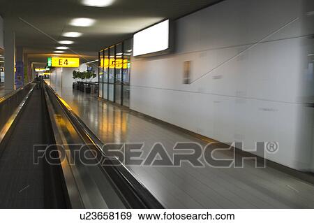 Stock Photo - Blurred Motion, Escalator, Empty, Building, Airport. Fotosearch