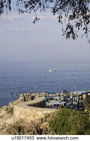 Stock Image - Boat, Bottles, Calm, Chair, Day. Fotosearch