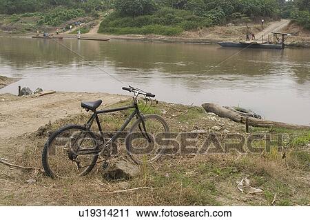 Stock Image - boats, countryside. Fotosearch